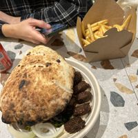 Bread is amazing! Also tasty fries  at Ta'ameya Falafel - Gallerian in Stockholm