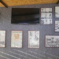 Historical info about the water tower on the walls at Bukhara Tower Restaurant in Bukhara