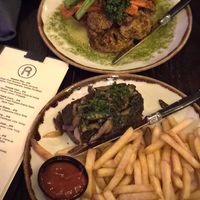 Chunk brand filet topped with mushrooms and accompanied with fries.   at R Bar in Asbury Park