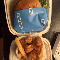 Loaded chicken sando and tots and fries!  at Shahar in Louisville