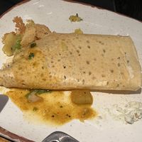 Half of the Masala dosa (crepe with potato filling) - really great; maybe the best we've ever tasted.  at MASKA in Hartsdale