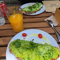 Avocado toast, orange juice, avocado & cucumber toast at Yanetta in Porto