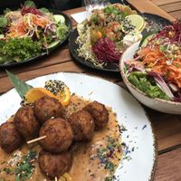 Vegan Falafel with mango sauce (SO good!), side salad, ceviche, salad with a big piece of cheese  at Das Reiskorn in Stuttgart