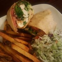 marinated tofu wrap with seasoned fries at Earth Bistro in Cleveland