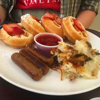 Berry waffles, hash browns and sausages - all vegan!! $10.50 at Earth Bistro in Cleveland