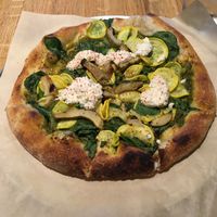 Grilled artichoke & pesto pizza.
Artichoke, spinach, summer squash, black walnut pesto, lemon, aleppo chili, vegan almond ricotta at True Food Kitchen - Fashion Valley Mall in San Diego