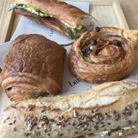 Two times sandwich mediteranéen, one pain au chocolat and a suisse  at Land & Monkeys - Les Halles in Paris