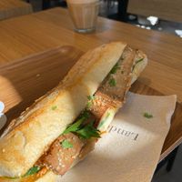 Banh mi and decaf cappuccino   at Land & Monkeys - Les Halles in Paris