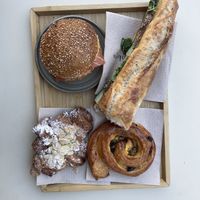 Banh-Mi Sandwich, Lachsbagel, Mandelcroissant & Rosinenschnecke, alles köstlich!   at Land & Monkeys - Les Halles in Paris