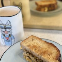 Half a tofu scrambled sandwich, they added Brussels sprouts & squash butter for added veggies. Staff is always SO sweet w/ vegan accommodations and have other options to recommend! at The Dot Cafe in Ames