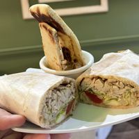Vegan Chicken Salad wrap with a side of Baba ghanoush and pita chips.  at Adam and Eve Cafe in Birmingham