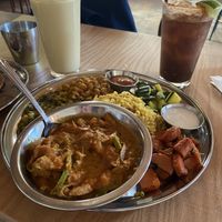 Curry Thali with Soy curls (center), Tamarind Limeade (left), and Mango Lassi (right)  at The Sudra - 28th Ave in Portland