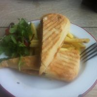 Vegan panini served with skin-on fries and house salad at The Cosy Club in Cardiff