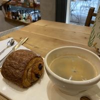 Vegan pain au chocolat and coffee at Le Pain Quotidien - Marais in Paris