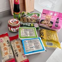 My first purchases in Alimentación Oriental store: four types of tofu, vegan kimchi, noodles, mushroom and soy sauce, vegan gyoza at Alimentación Oriental in Lugones