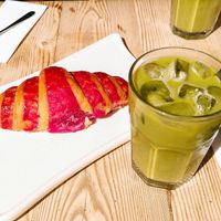 Matcha latte and hibiscus croissant (all vegan) at Le Pain Quotidien - Victoires in Paris