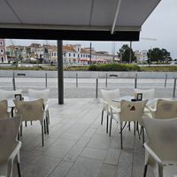 Outdoor seating at the front overlooking the canal for sunnier days. at Guaro's Burger Bar in Aveiro