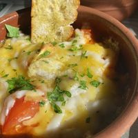 Veganaki (Gemüse in Tomatensauce mit veganen Käse überbacken)  at Yamas  in Dortmund