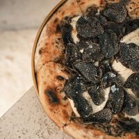 Truffle pizza Amazing  at TAAMA Restaurant in Dubai