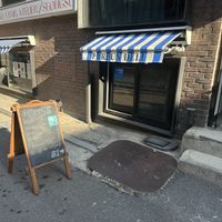 Sign at entrance of restaurantt  at Pureun Deli - 푸른델리 in Seoul