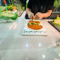 Cigkofte wrap being prepared at Vegan Dunyasi Cigkofte at Vegan Dünyası Ciğköfte in Berlin