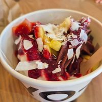 Açai, coconut frozen yoghurt, raspberry coulis, strawberries, pineapple and coconut flakes ❤️ at Yo-Chi in Fremantle