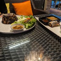 Spring roll with sweet chili dip (mild) and red curry satay dip (hot!) and red bean rice tofu at 3 Monkeys in Hua Hin