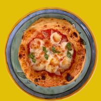 Pizza with pear and tomato sauce, can be vegan at San Pizzerino in Novi Sad