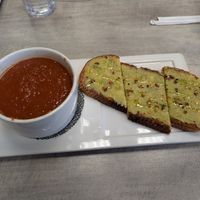 Vegan Tomato Basil & Avocado Toast at Paisley Pear Wine Bar, Bistro and Market in Hays