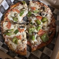 Vegan supreme pizza   at Happy Place Eatery in Ventura