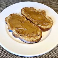 Sourdough toast with peanut butter  at Taybeh Restaurant in Aqaba