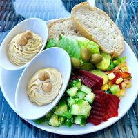 Hummus, salad and bread  at East & Seaboard  in Dubai