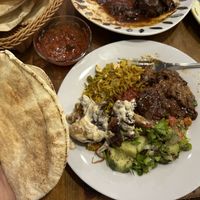 Food was served with complimentary bread. I recommend to combine a few dishes together!  at Ashur Banipal in Sofia