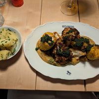 Cauliflower and sweetcorn on a lentil puree with a side of potatoes at Hutschpferd Palais in Kitzbuehel
