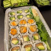 Three rolls: 1. Avocado, cucumber, asparagus. 2. Tempura sweet potato. 3. Inari tofu and avocado. Tempeh roll and edamame in the background! at Zen Sushi in Asheville