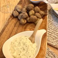 Granadillo - Canary black potatoes with smoked mojo and watercress aioli .  at Berro Bistrot in Gran Canaria