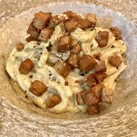 Mocán - pasta carbonara with smoked cashew cream, turmeric and kala namak.  at Berro Bistrot in Gran Canaria