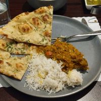 Baigan Bartha (vegan) eggplant based entree, and garlic naan (vegetarian) at Indian Delight in Portage