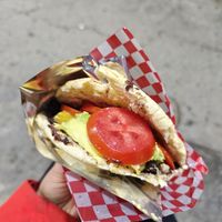 Vegan arepa with tomato, platano, avocado & black beans at Deliciosas Empanadas Venezolanas in Salento