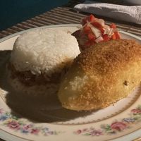 Arroz tapado y papa rellena dos clásicos de la comida peruana at Ciao Mamma in Rocha