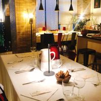 la Taverna alla sera con la tavola da condividere  at La Taverna degli Arna in Milan