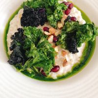 piatto principale di dicembre: sorgotto alla panna di cavolfiore, cavolo riccio spadellato, mandorle al sale e melagrana at La Taverna degli Arna in Milan