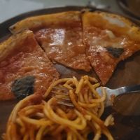 vegan margherita pizza with red putanesca spaghetti at BUONO Pizzeria in Alibaug