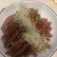 Seasonal grain bowl with plant protein. Can’t really see all the goodness under the plant burger.   at Dish Society in Katy