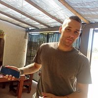 Waiter and co-owner at Big Leaf Mesa  in La Paz