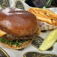 Basic Burger (sub Impossible Patty & vegan cheddar cheese) with seasoned fries  at Drafts Burger Bar in Park City