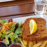 Schnitzel Wiener Art. So simple but so good! Love the dressing of the salad as well! at Bodhi in Munich