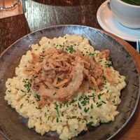 "Käsespätzle" mit Rostzwiebeln + Salat at Bodhi in Munich