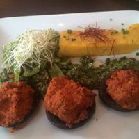 Baked Portobello with polenta and pesto  at Bodhi in Munich