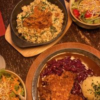 Käsespätzle (on top) with side salad; Soy cutlet with red cabbage and potato dumpling (bottom) with side salad: both amazing   at Bodhi in Munich